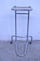 MCKESSON ENTRUST STAINLESS STEEL BESIDE SURGICAL TABLE