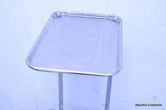 MCKESSON ENTRUST STAINLESS STEEL BESIDE SURGICAL TABLE