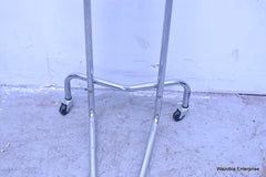 MCKESSON ENTRUST STAINLESS STEEL BESIDE SURGICAL TABLE