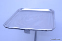 MCKESSON ENTRUST STAINLESS STEEL BESIDE SURGICAL TABLE