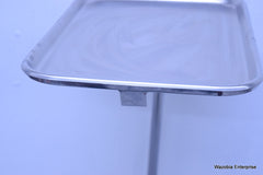 MCKESSON ENTRUST STAINLESS STEEL BESIDE SURGICAL TABLE