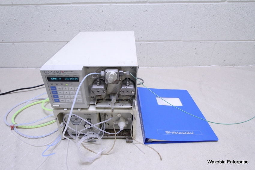 SHIMADZU LC-10AD LIQUID CHROMATOGRAPHY SOLVENT DELIVERY PUMP WITH MANUAL